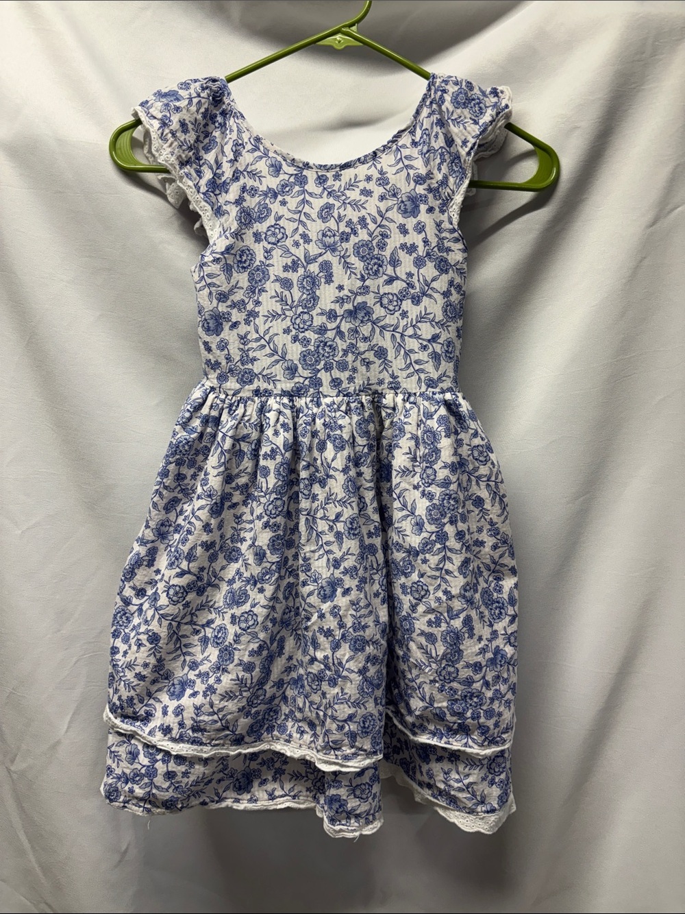 Pippa & Julie White Dress with Blue Floral Print and Ruffle Sleeves